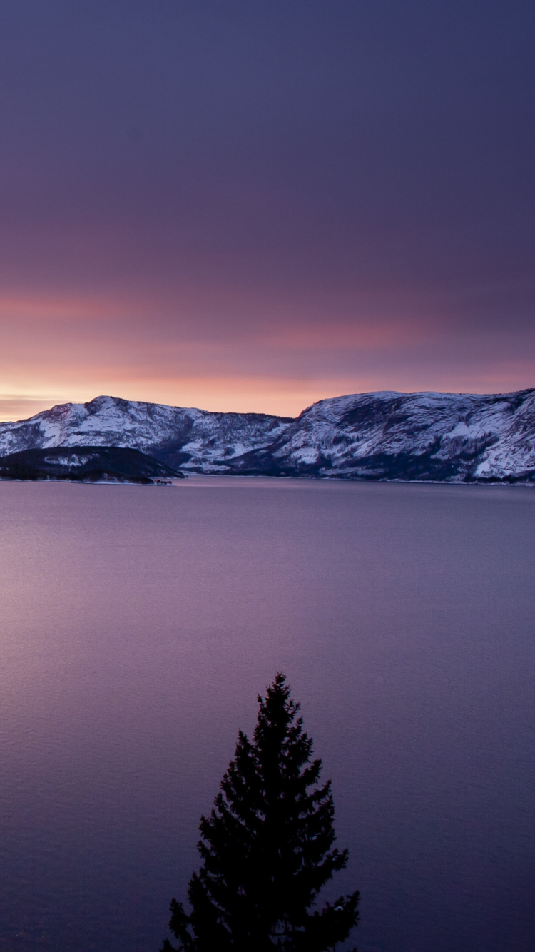 Body of Water Near Mountain During Daytime. Wallpaper in 750x1334 Resolution