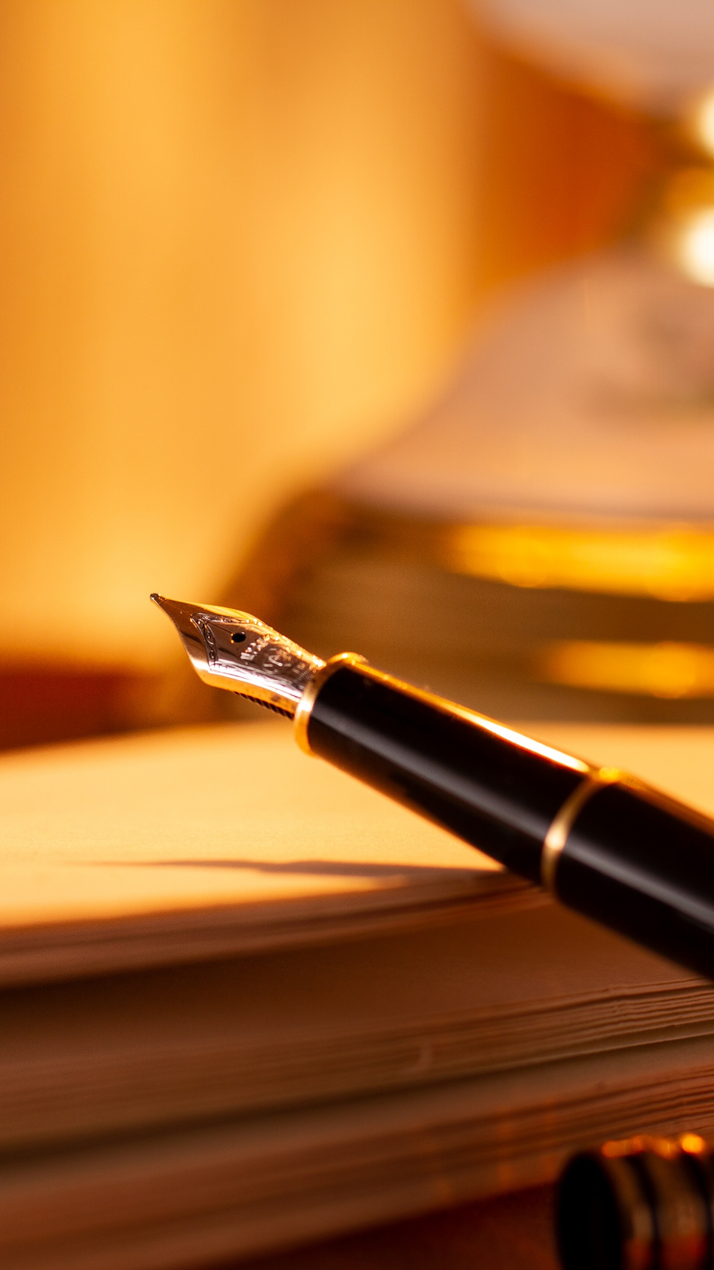 Black and Gold Fountain Pen on Brown Wooden Table. Wallpaper in 1440x2560 Resolution