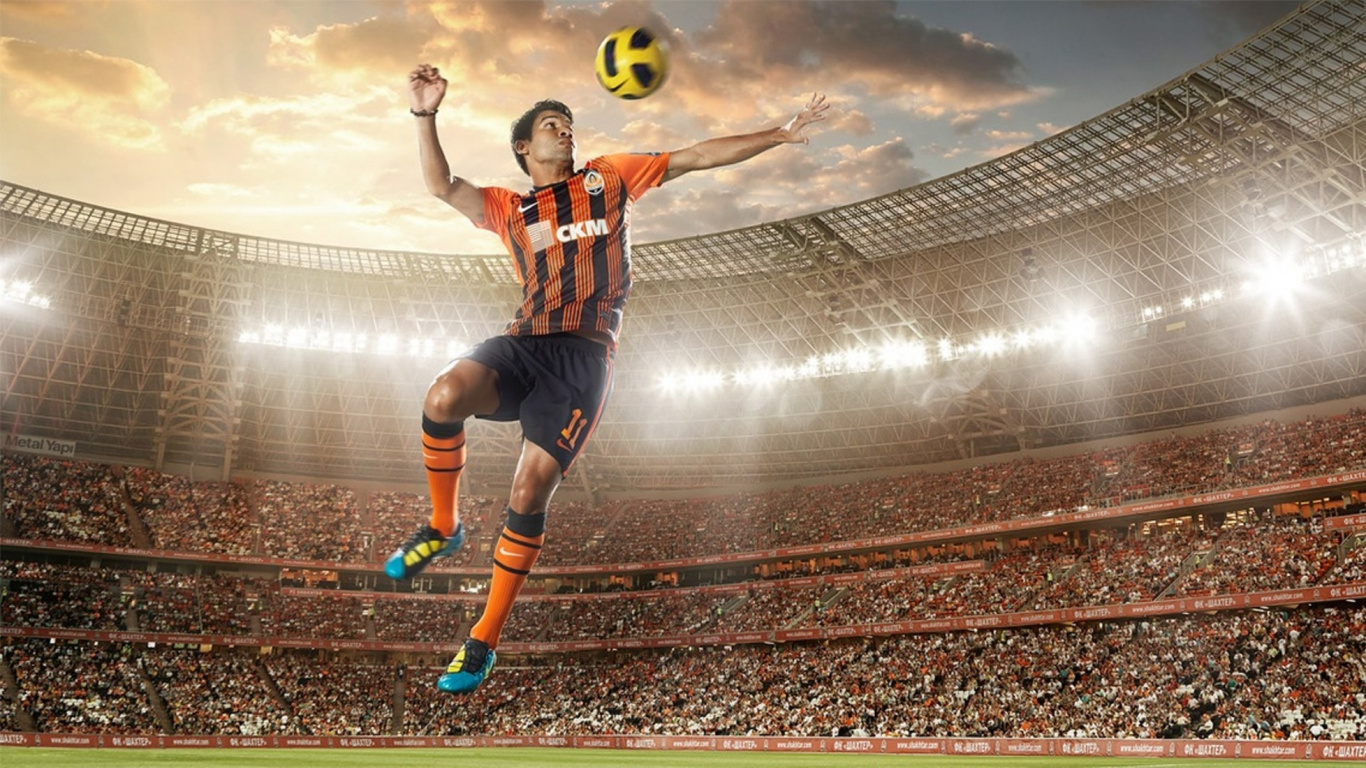 Man in Blue and White Jersey Shirt Playing Soccer. Wallpaper in 1366x768 Resolution