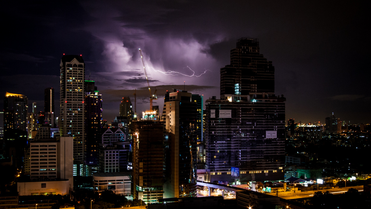 City With High Rise Buildings During Night Time. Wallpaper in 1280x720 Resolution