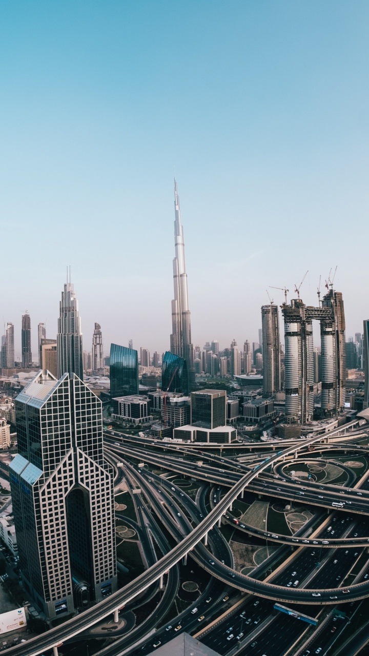 City Skyline Under Blue Sky During Daytime. Wallpaper in 720x1280 Resolution