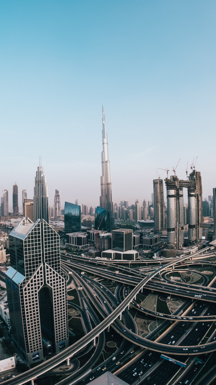 City Skyline Under Blue Sky During Daytime. Wallpaper in 750x1334 Resolution