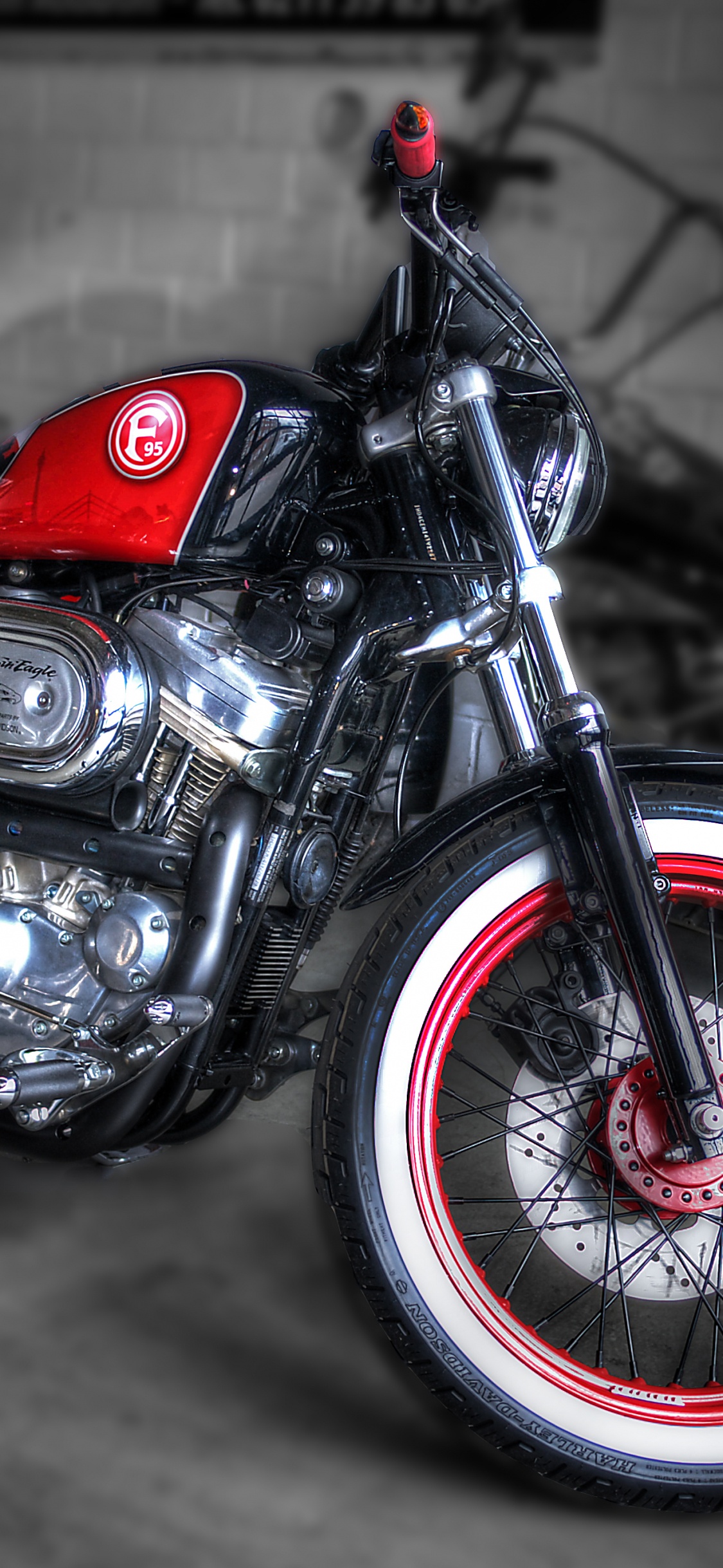 Red and Black Cruiser Motorcycle. Wallpaper in 1125x2436 Resolution