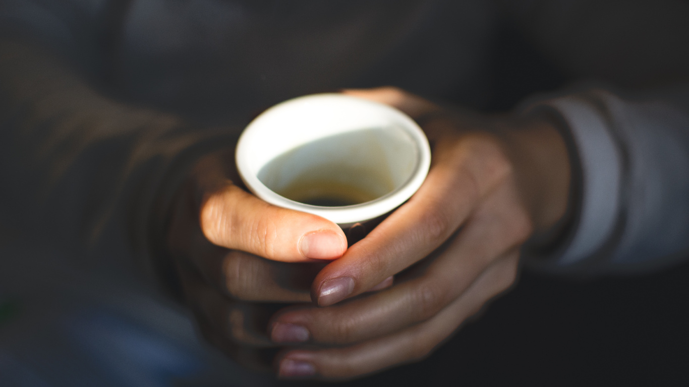 Person Holding White Ceramic Mug. Wallpaper in 1366x768 Resolution