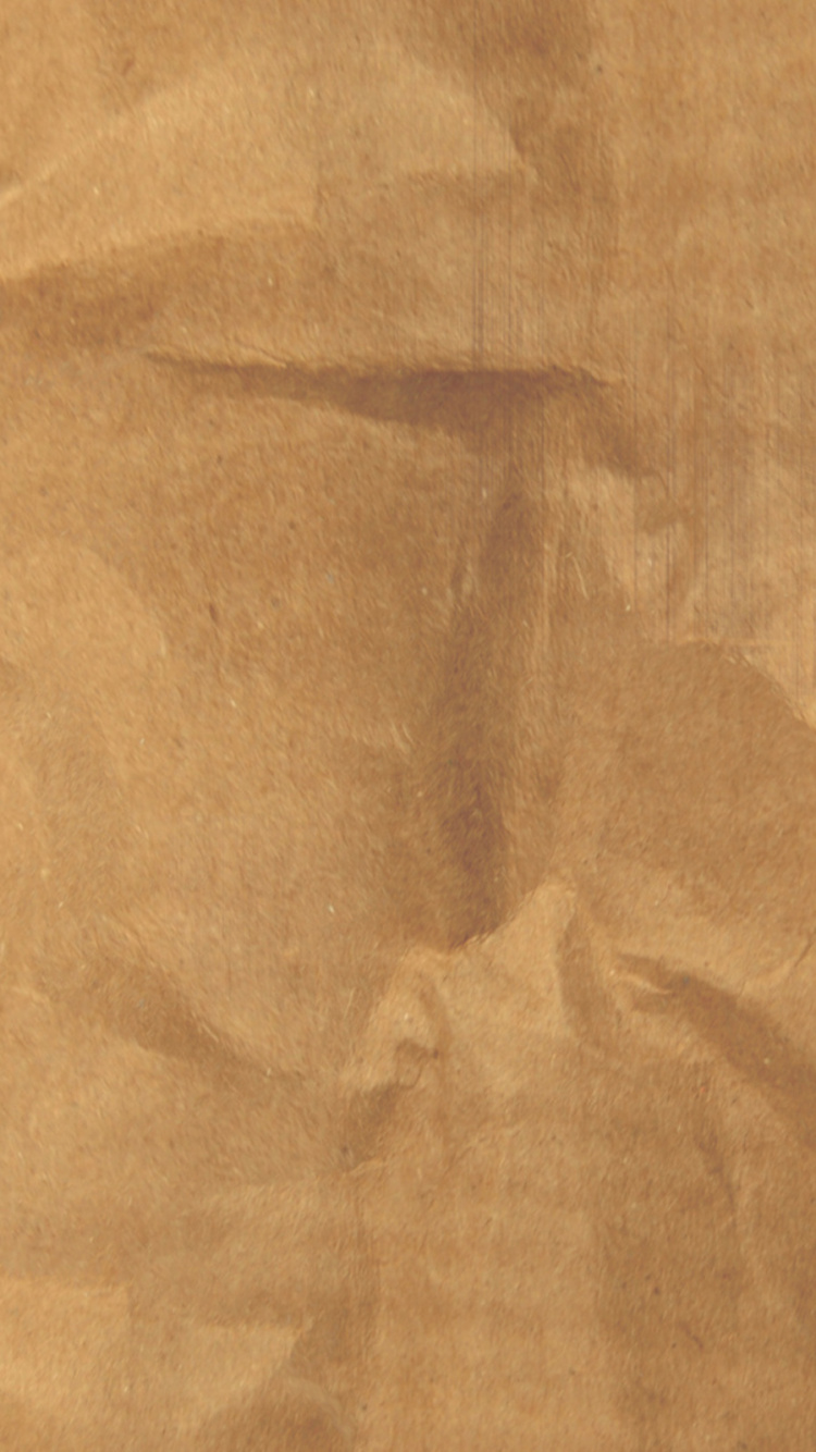 Brown Textile on Brown Wooden Table. Wallpaper in 750x1334 Resolution