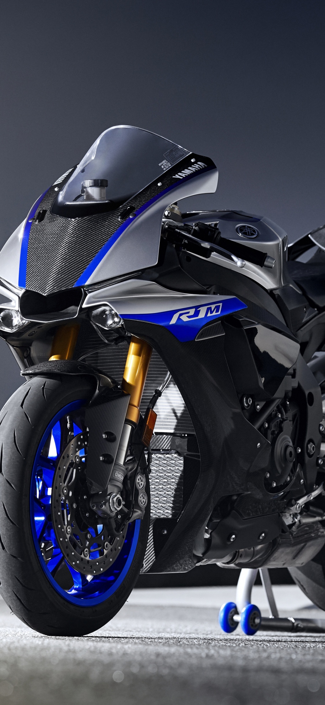 White and Black Sports Bike. Wallpaper in 1125x2436 Resolution