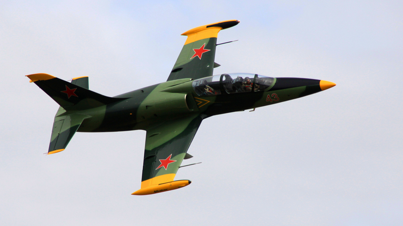 Black and Yellow Jet Plane in Mid Air. Wallpaper in 1366x768 Resolution