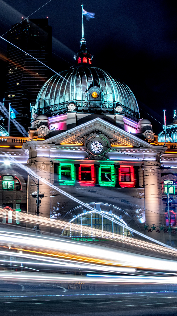 Time Lapse Photography of Cars on Road Near Green and Brown Dome Building During Night Time. Wallpaper in 750x1334 Resolution