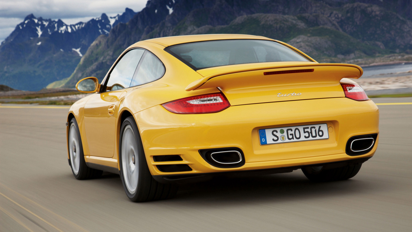 Orange Porsche 911 on Road During Daytime. Wallpaper in 1366x768 Resolution