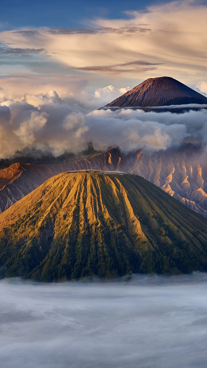 Brown Mountain Under White Clouds During Daytime. Wallpaper in 720x1280 Resolution