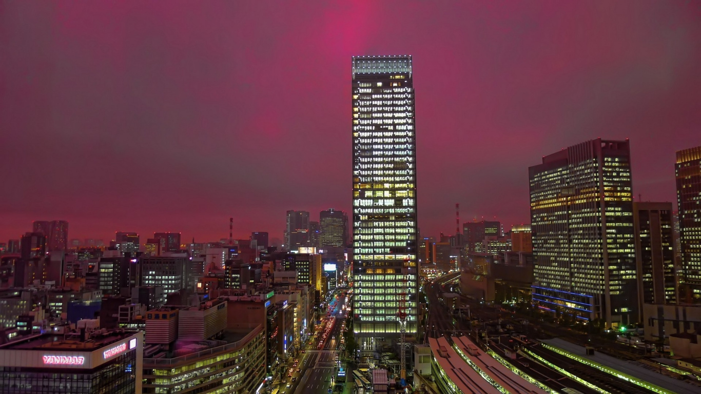 City Buildings During Night Time. Wallpaper in 1366x768 Resolution