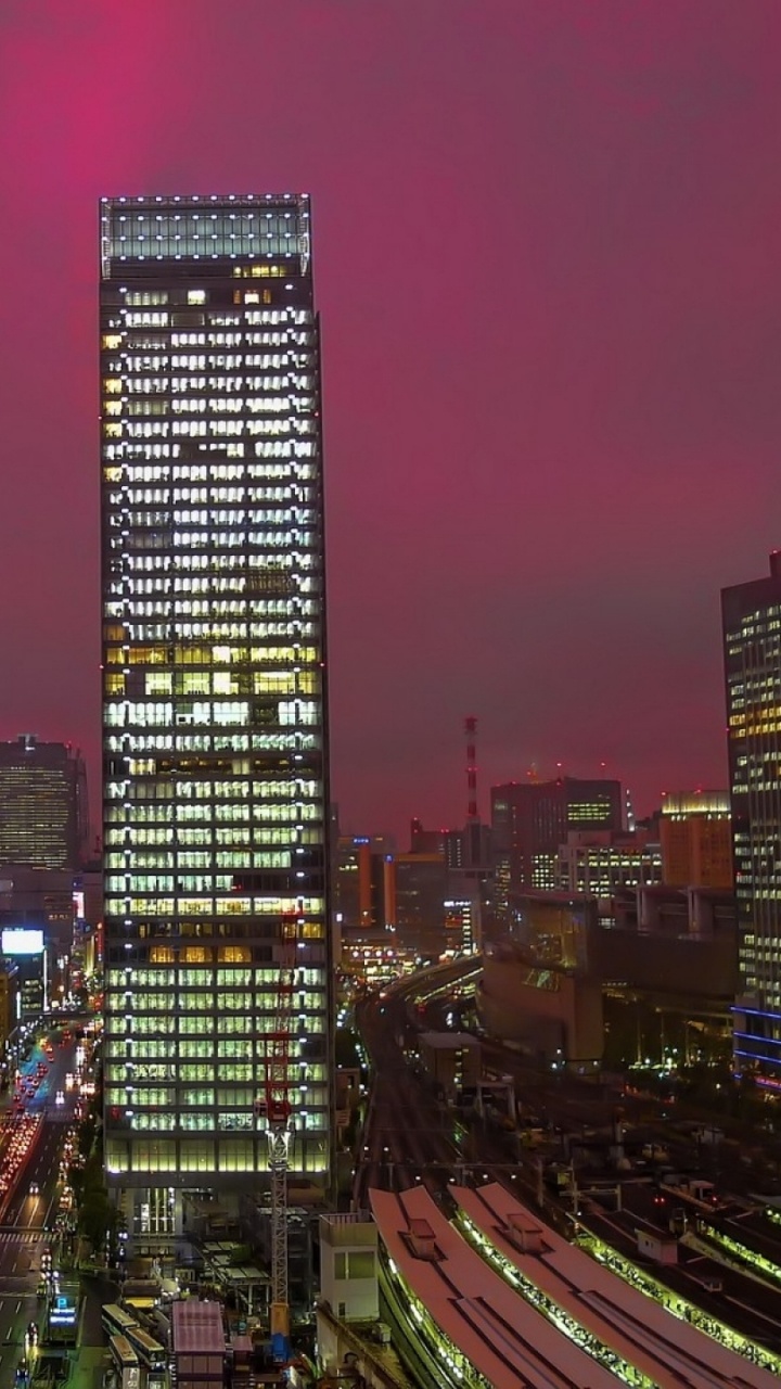 City Buildings During Night Time. Wallpaper in 720x1280 Resolution