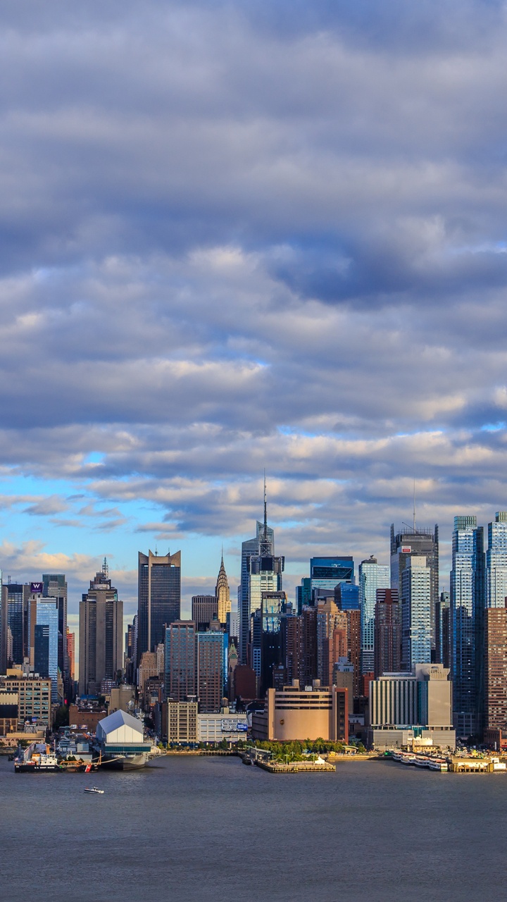 City Skyline Under Cloudy Sky During Daytime. Wallpaper in 720x1280 Resolution