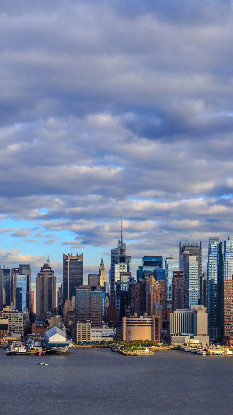 City Skyline Under Cloudy Sky During Daytime. Wallpaper in 750x1334 Resolution