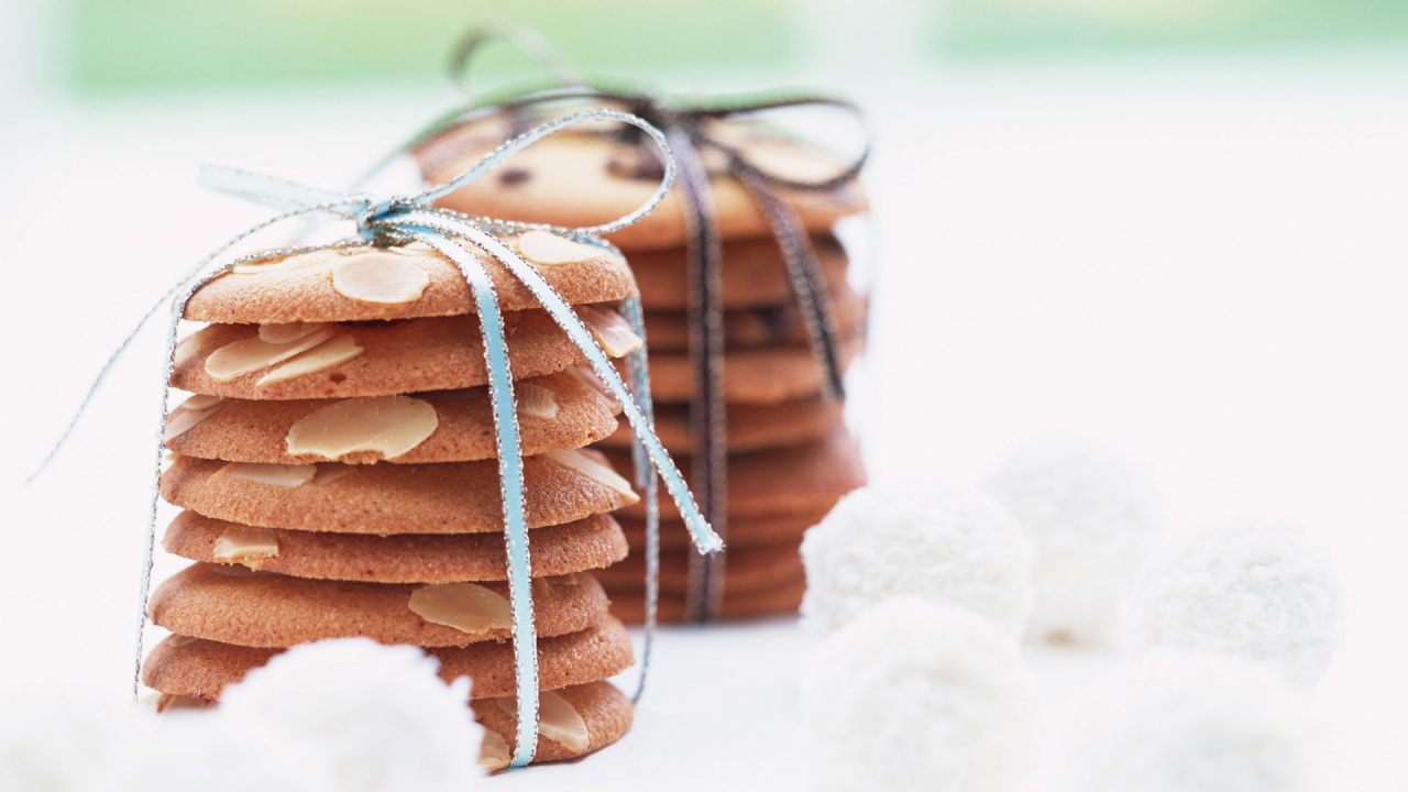 Brown and White Cookies on White Table. Wallpaper in 1280x720 Resolution