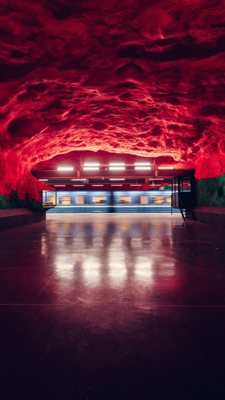 Brown Concrete Floor With Red and Blue Lights. Wallpaper in 720x1280 Resolution