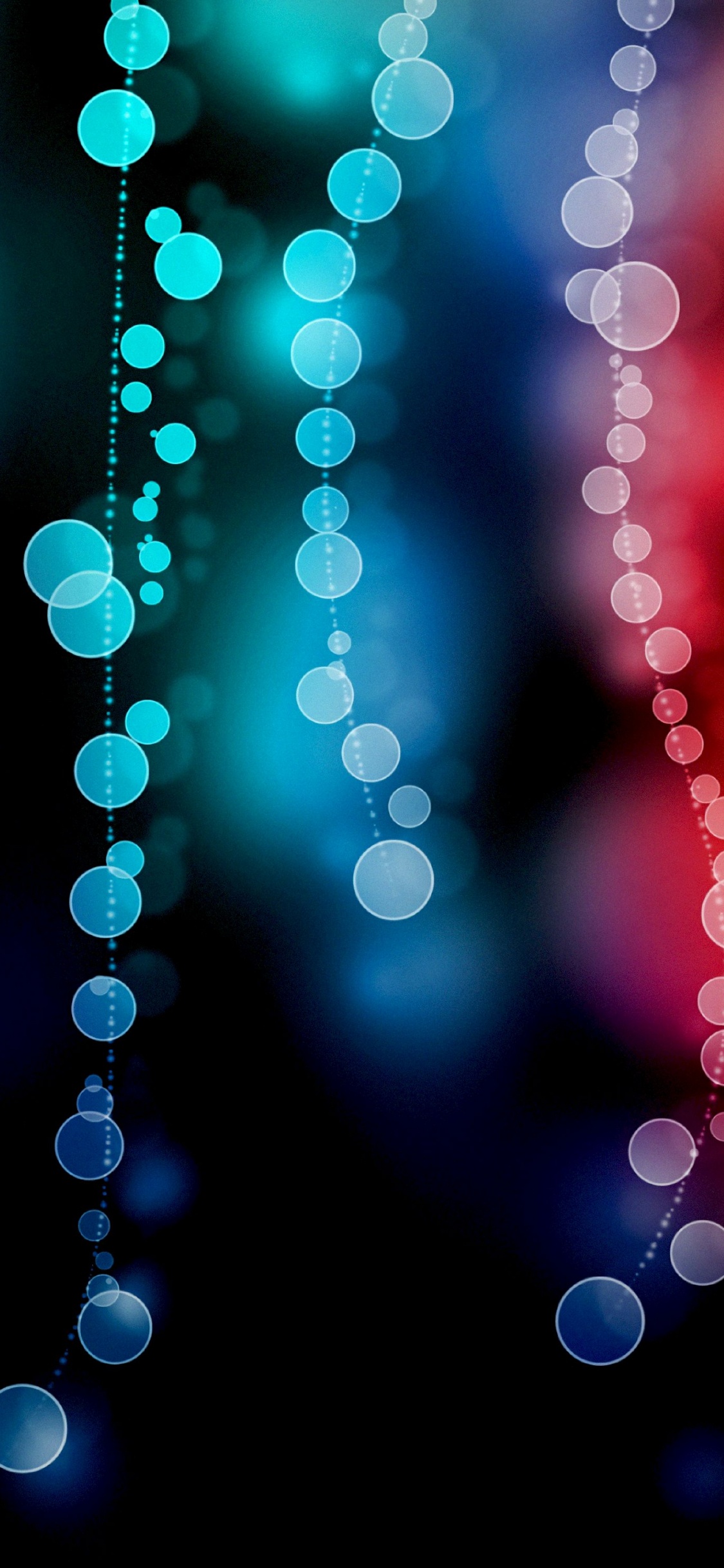 Orange Und Gelbe Bokeh-Lichter. Wallpaper in 1125x2436 Resolution