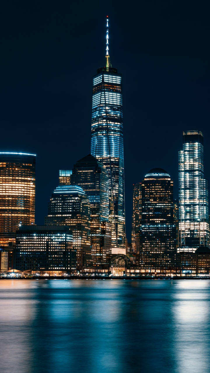 City Skyline During Night Time. Wallpaper in 720x1280 Resolution