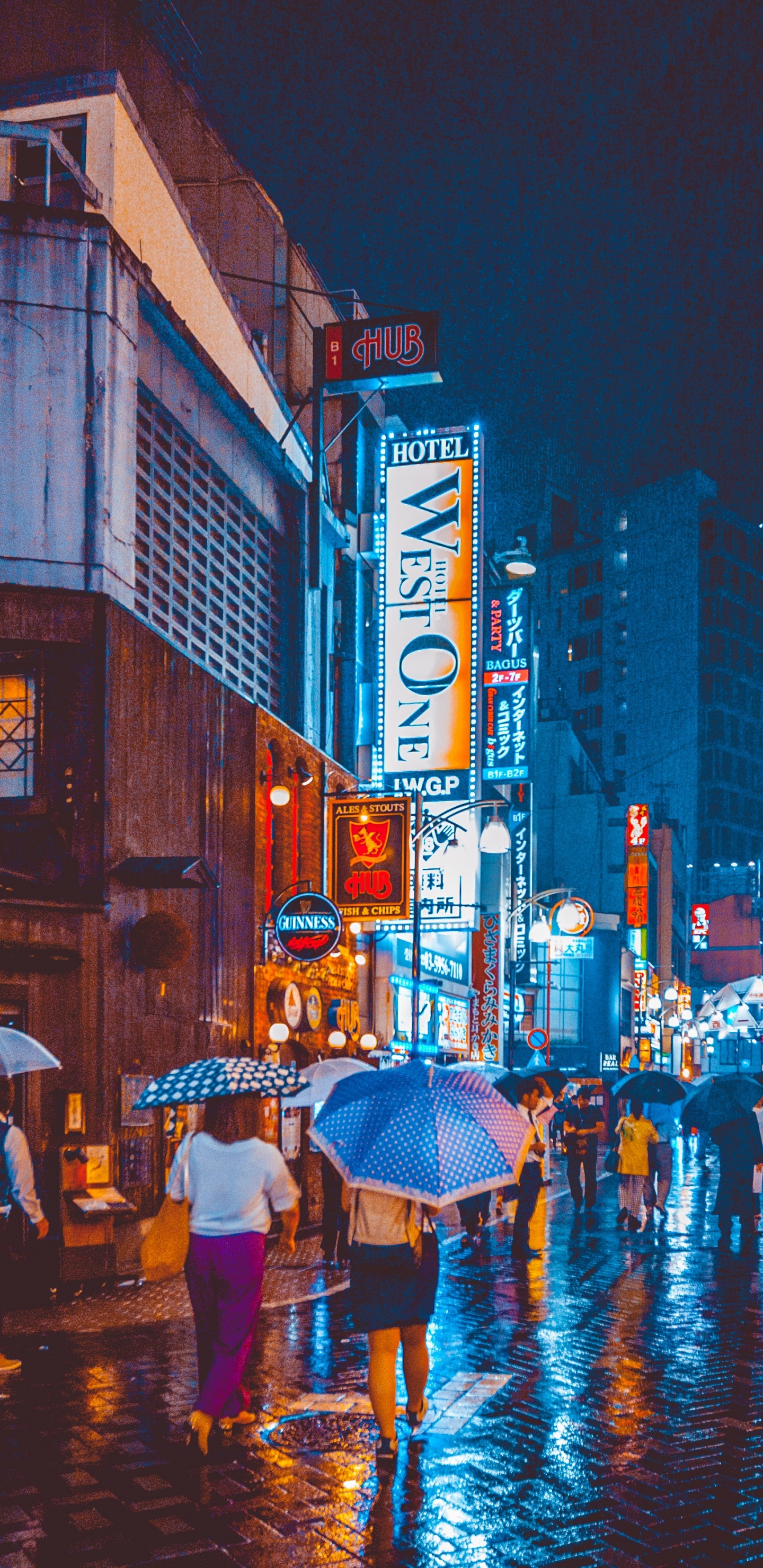 People Walking on Street During Night Time. Wallpaper in 1440x2960 Resolution