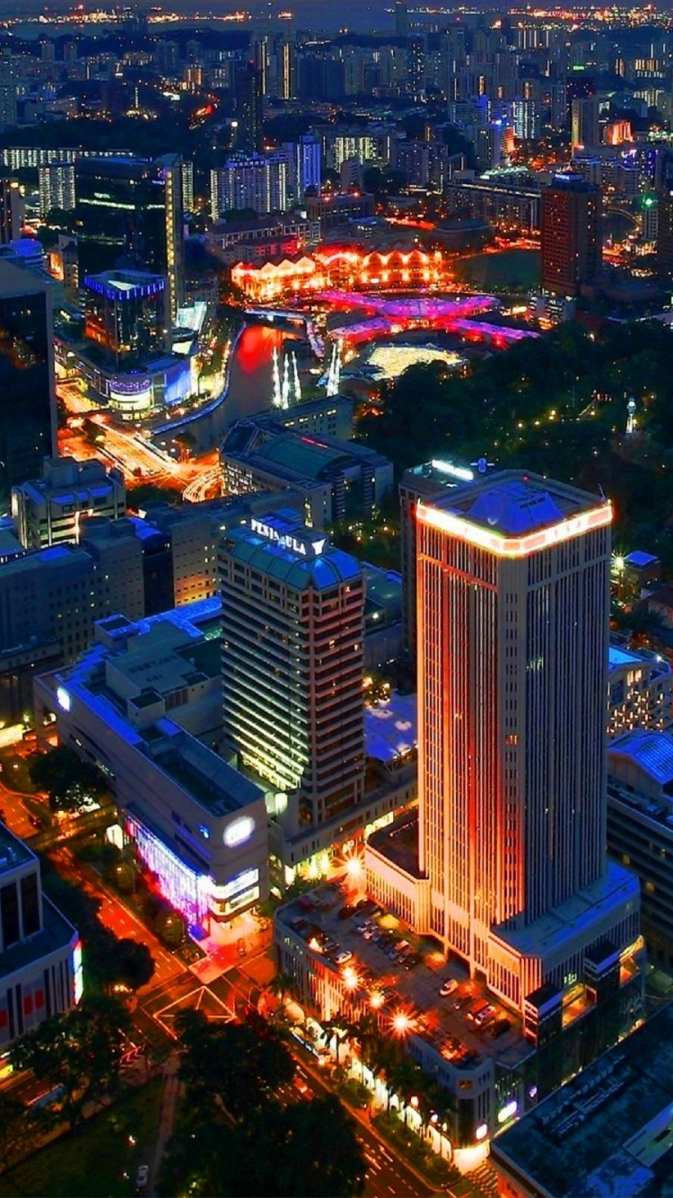 Vue Aérienne de la Ville Pendant la Nuit. Wallpaper in 750x1334 Resolution