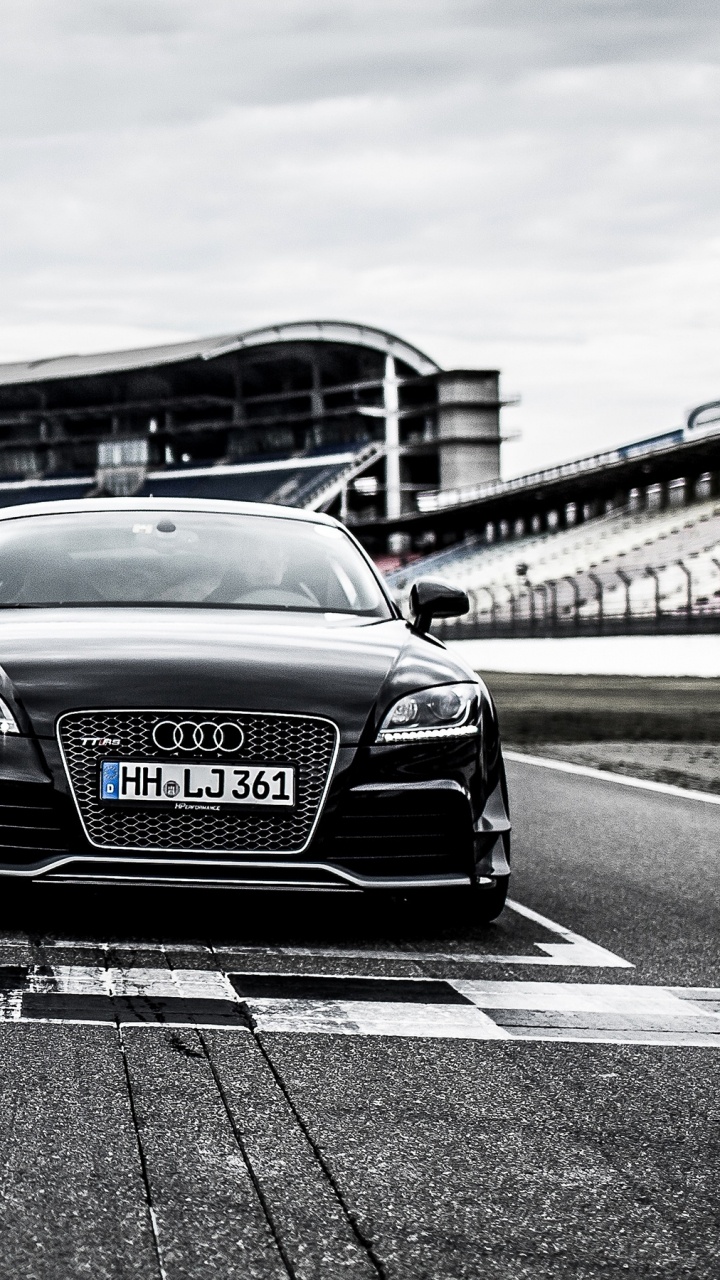 Schwarzer Porsche 911 Unterwegs. Wallpaper in 720x1280 Resolution