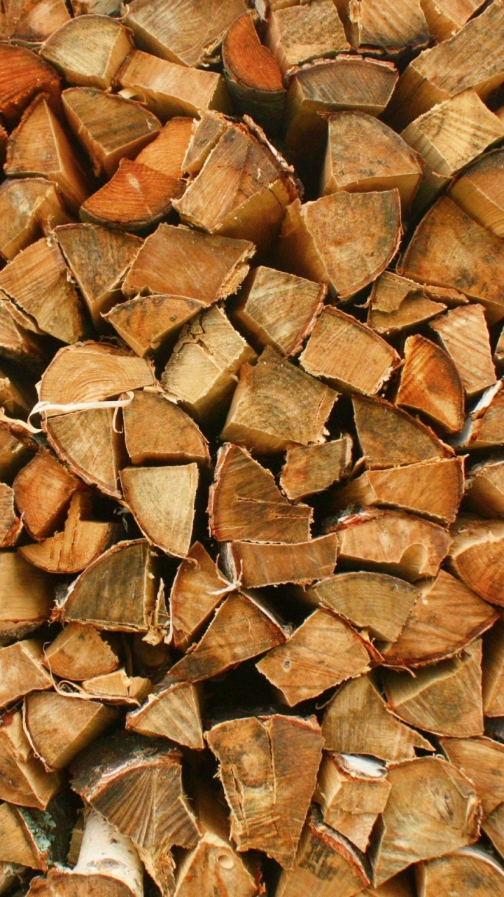 Lote de Troncos de Madera Marrón Durante el Día. Wallpaper in 720x1280 Resolution