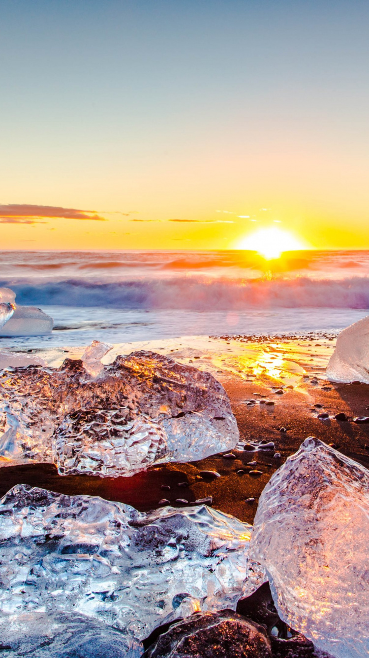 Gray and Brown Rocks on Seashore During Sunset. Wallpaper in 750x1334 Resolution