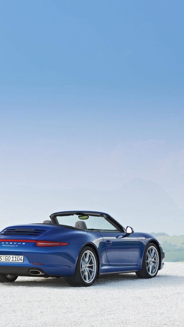 Blue Bmw Coupe on White Sand During Daytime. Wallpaper in 720x1280 Resolution