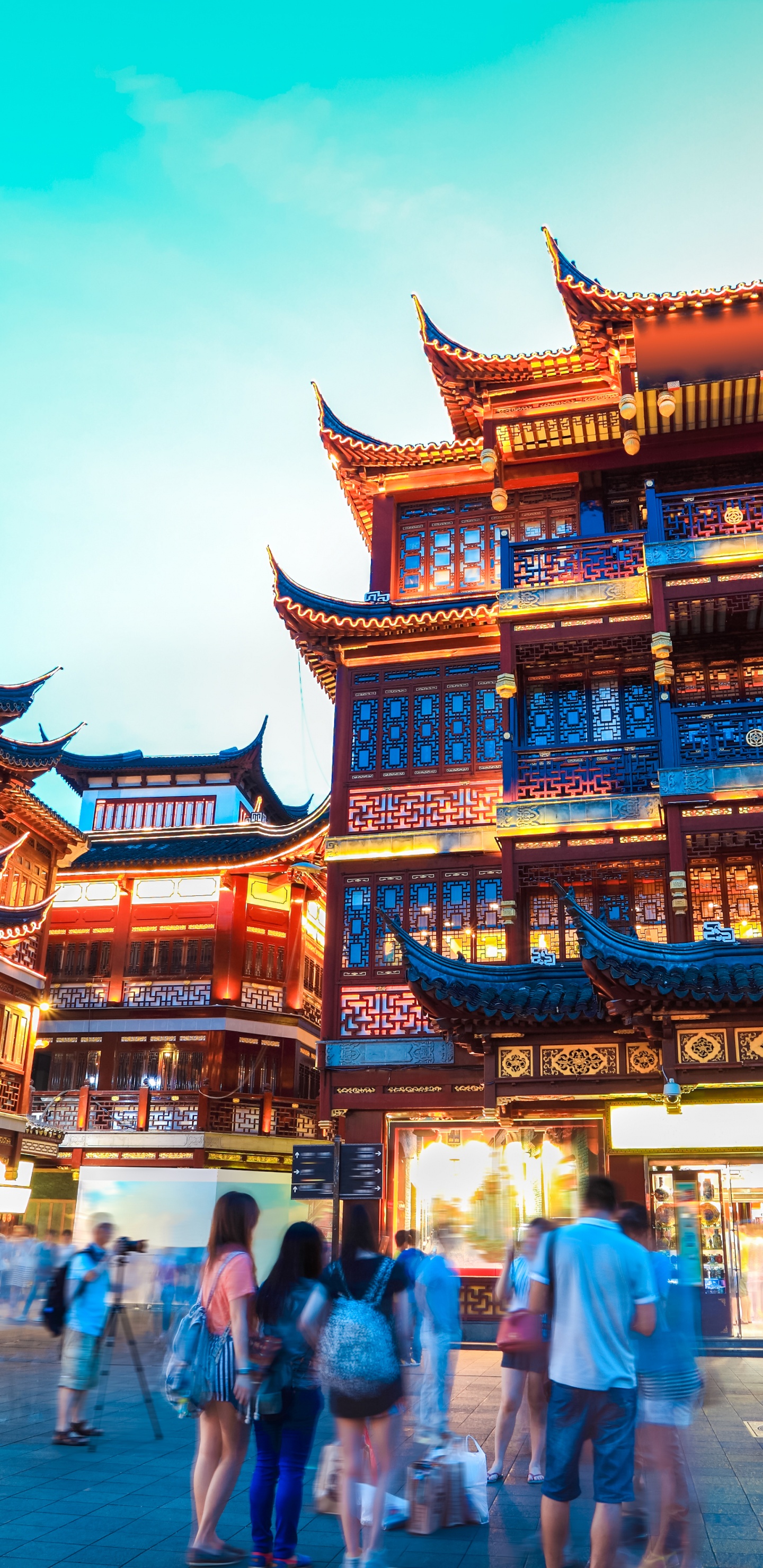 People Walking on Street Near Brown and White Building During Daytime. Wallpaper in 1440x2960 Resolution