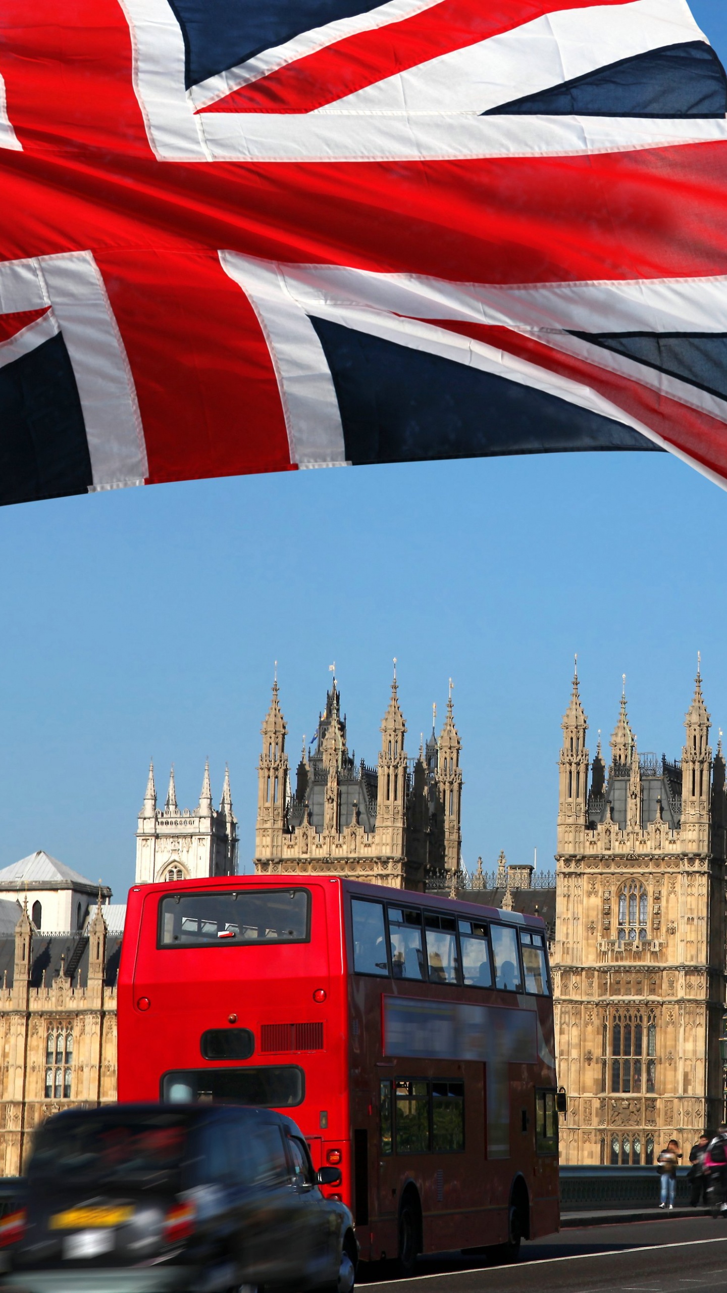 Red Double Decker Bus on Road Near Big Ben During Daytime. Wallpaper in 1440x2560 Resolution