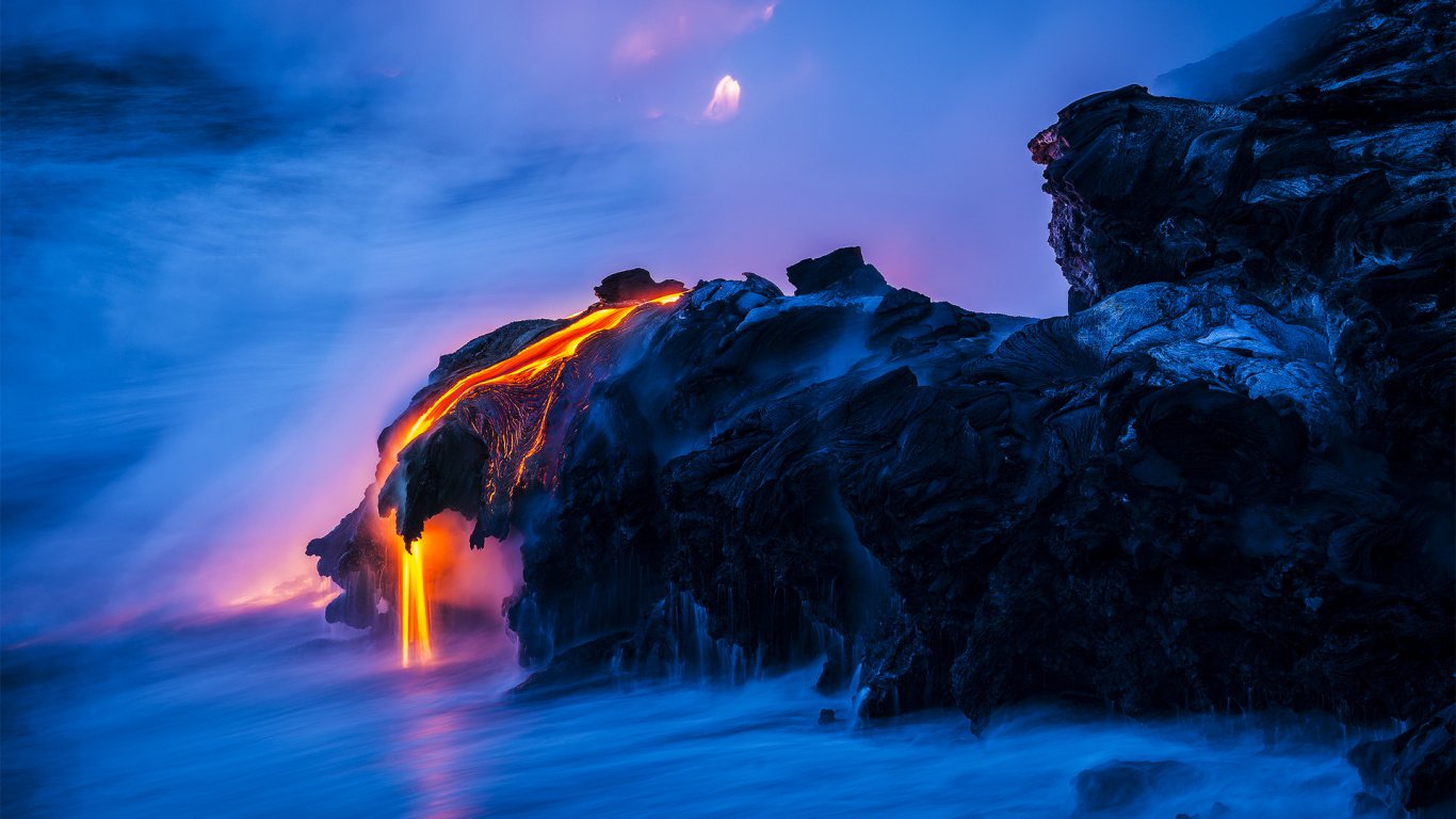 Brown Rock Formation on Body of Water During Night Time. Wallpaper in 1366x768 Resolution