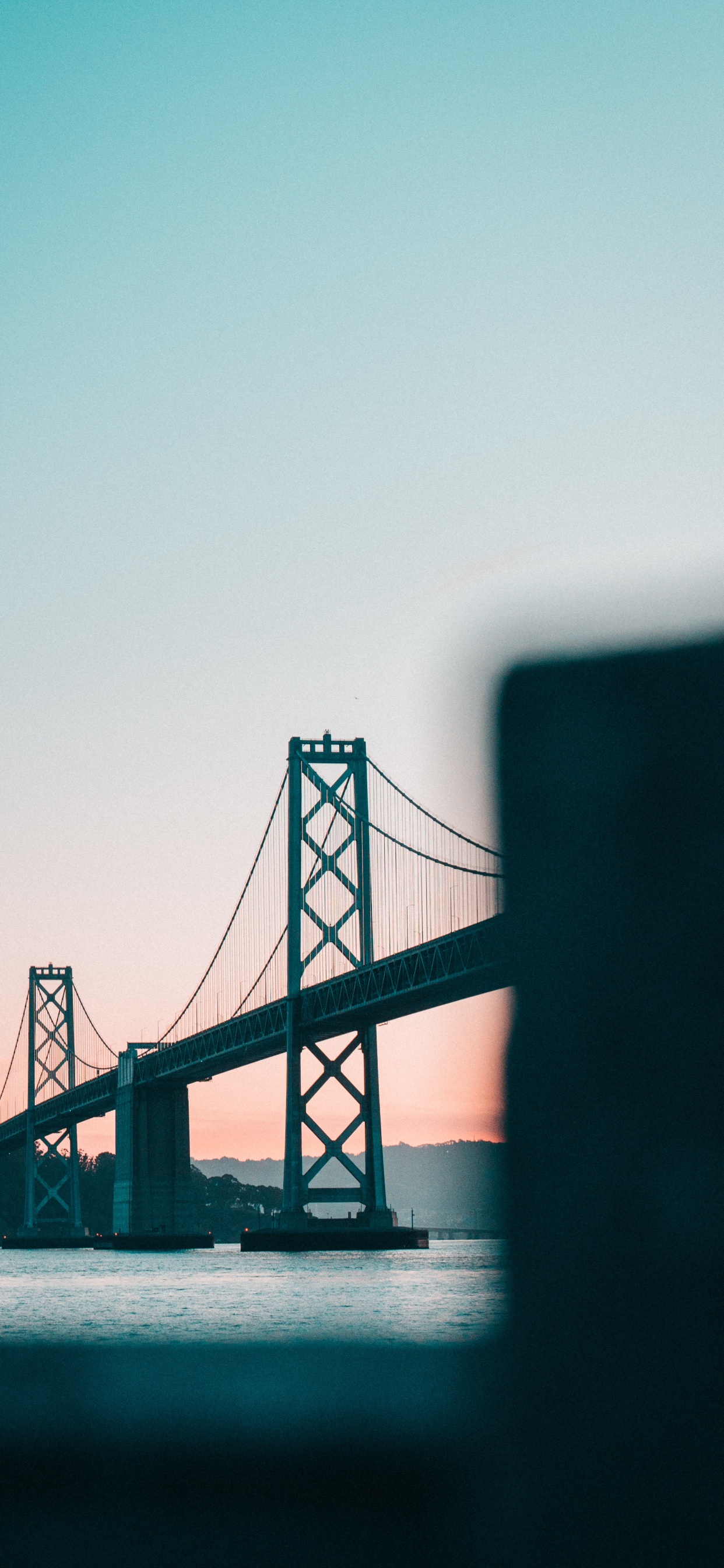 Bridge Over Body of Water. Wallpaper in 1242x2688 Resolution