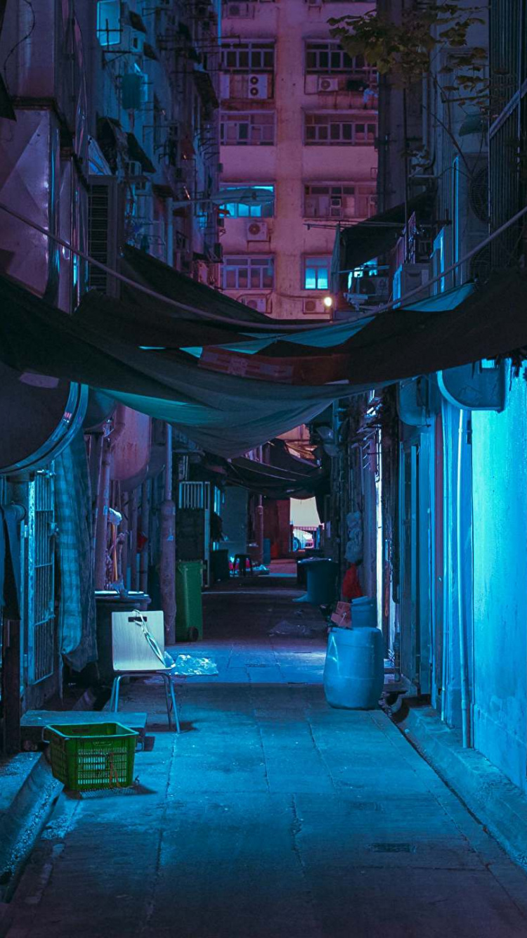 Blaues Und Schwarzes Betongebäude. Wallpaper in 750x1334 Resolution