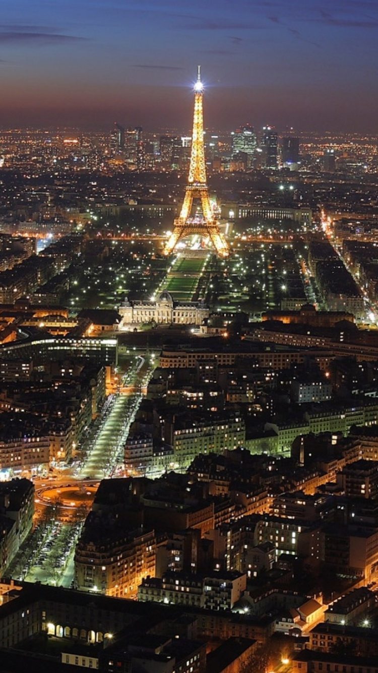 Aerial View of City Buildings During Night Time. Wallpaper in 750x1334 Resolution