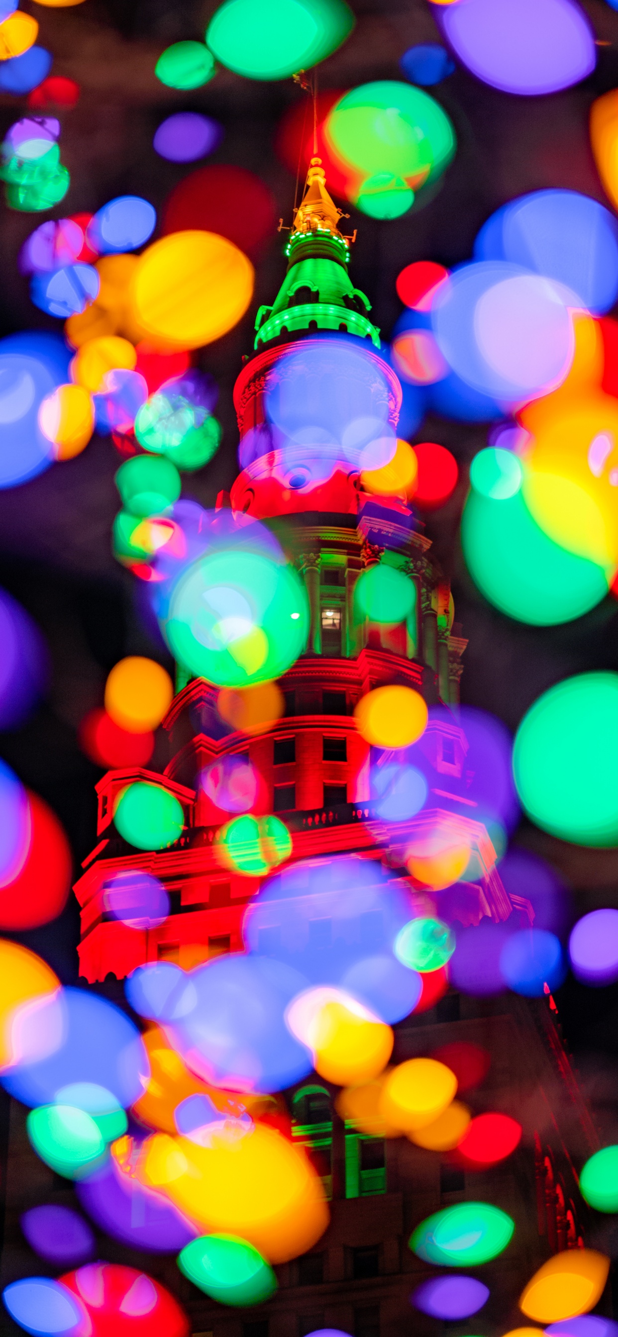 Blue Green and Yellow Light Bokeh. Wallpaper in 1242x2688 Resolution