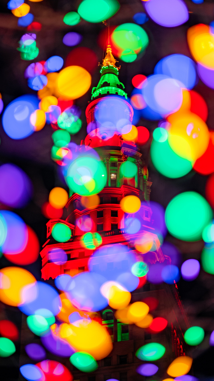 Blaugrünes Und Gelbes Helles Bokeh. Wallpaper in 750x1334 Resolution