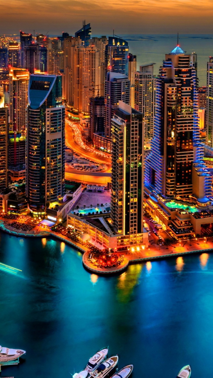 City Skyline During Night Time. Wallpaper in 720x1280 Resolution