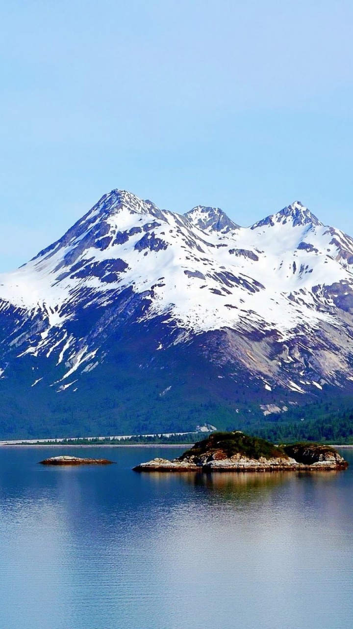 Snow Covered Mountain Near Lake During Daytime. Wallpaper in 720x1280 Resolution