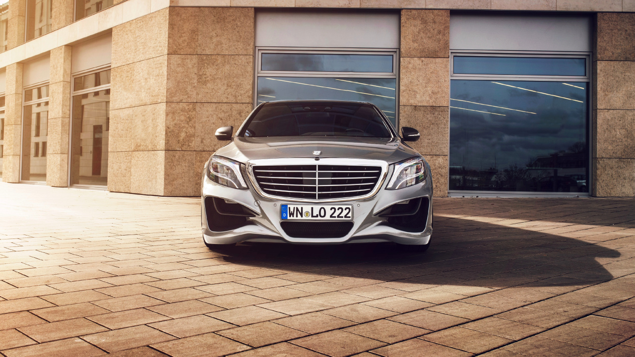 White Mercedes Benz Car Parked Beside Brown Brick Wall. Wallpaper in 1280x720 Resolution