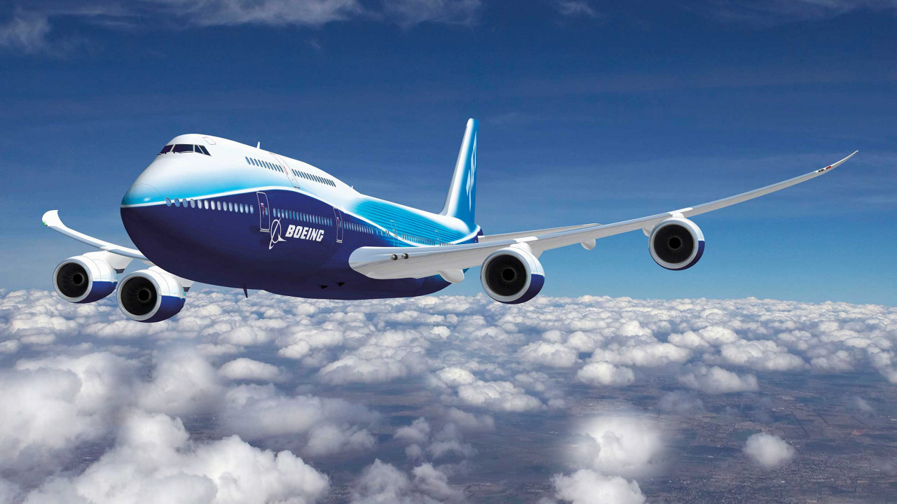 Avión Blanco y Azul Volando Bajo un Cielo Azul Durante el Día. Wallpaper in 1280x720 Resolution
