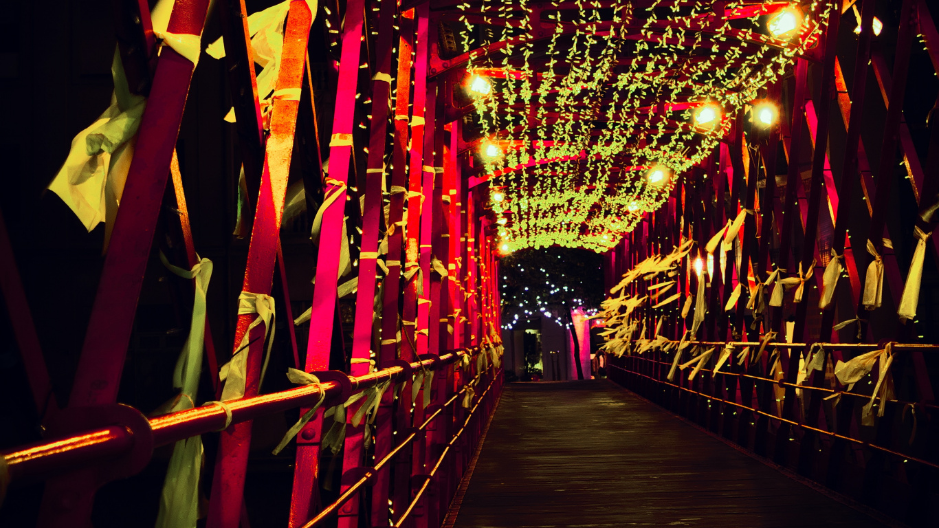 Red String Lights on Brown Wooden Bridge. Wallpaper in 1366x768 Resolution