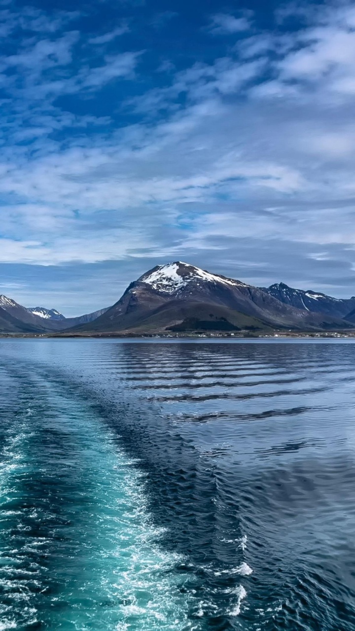 Body of Water Near Mountain Under Blue Sky During Daytime. Wallpaper in 720x1280 Resolution