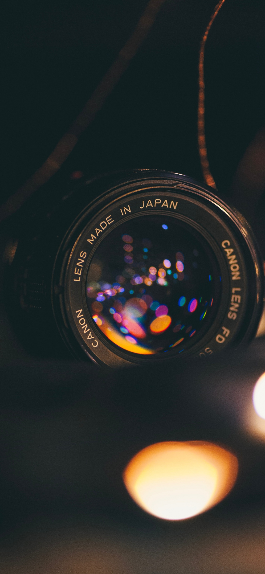 Black Nikon Dslr Camera Lens. Wallpaper in 1125x2436 Resolution