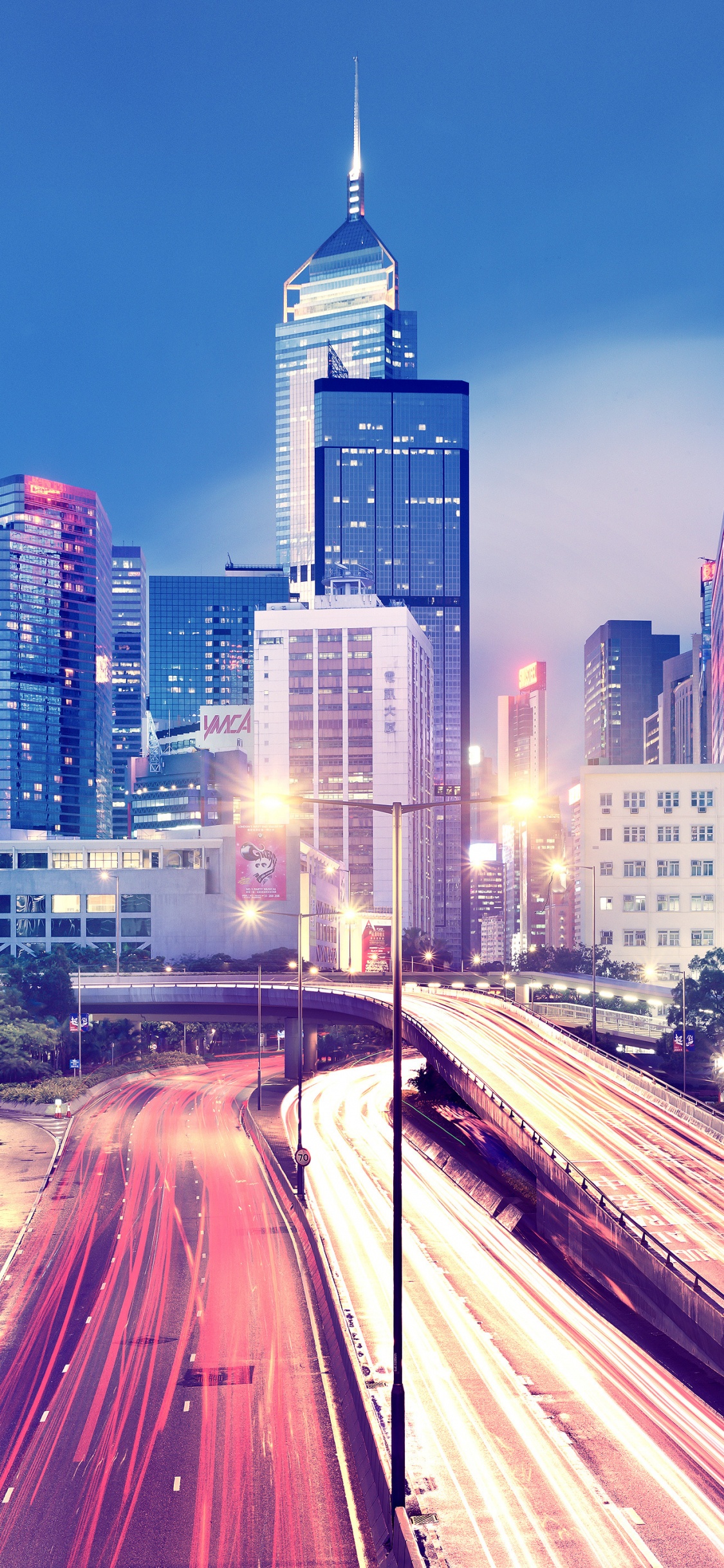 City Buildings During Night Time. Wallpaper in 1125x2436 Resolution