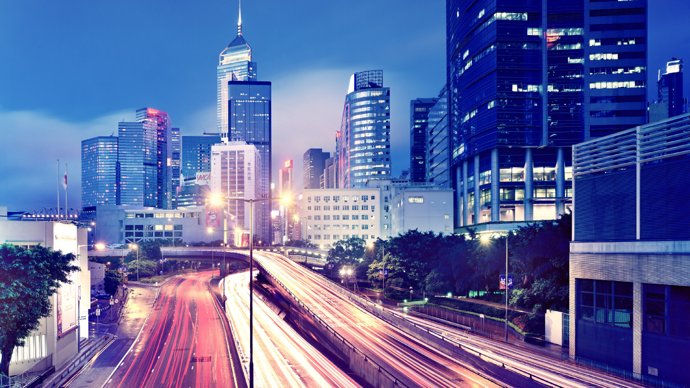 City Buildings During Night Time. Wallpaper in 1366x768 Resolution