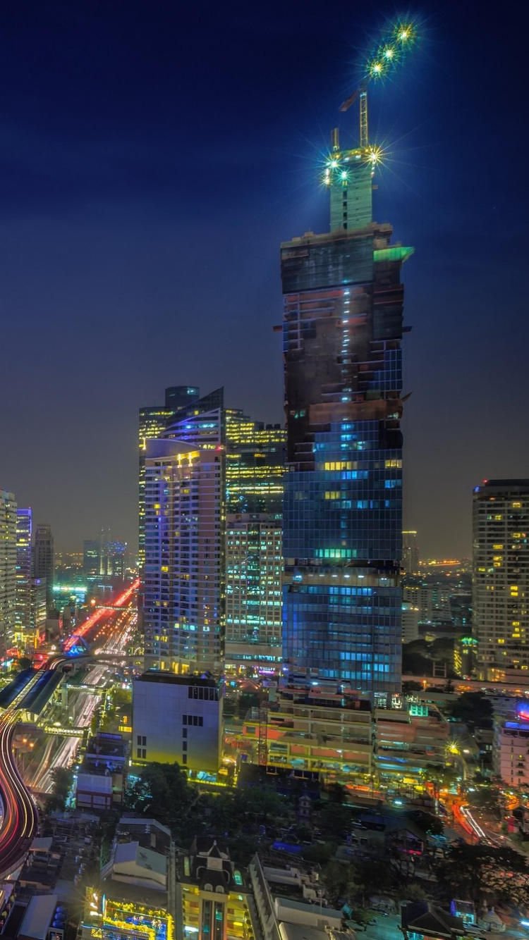City Skyline During Night Time. Wallpaper in 750x1334 Resolution