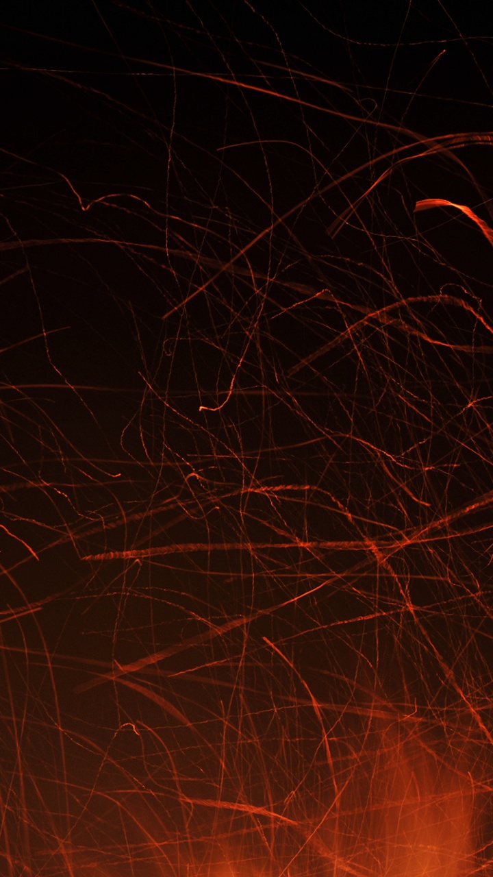 Rote Und Gelbe Lichter Auf Dunklem Hintergrund. Wallpaper in 720x1280 Resolution