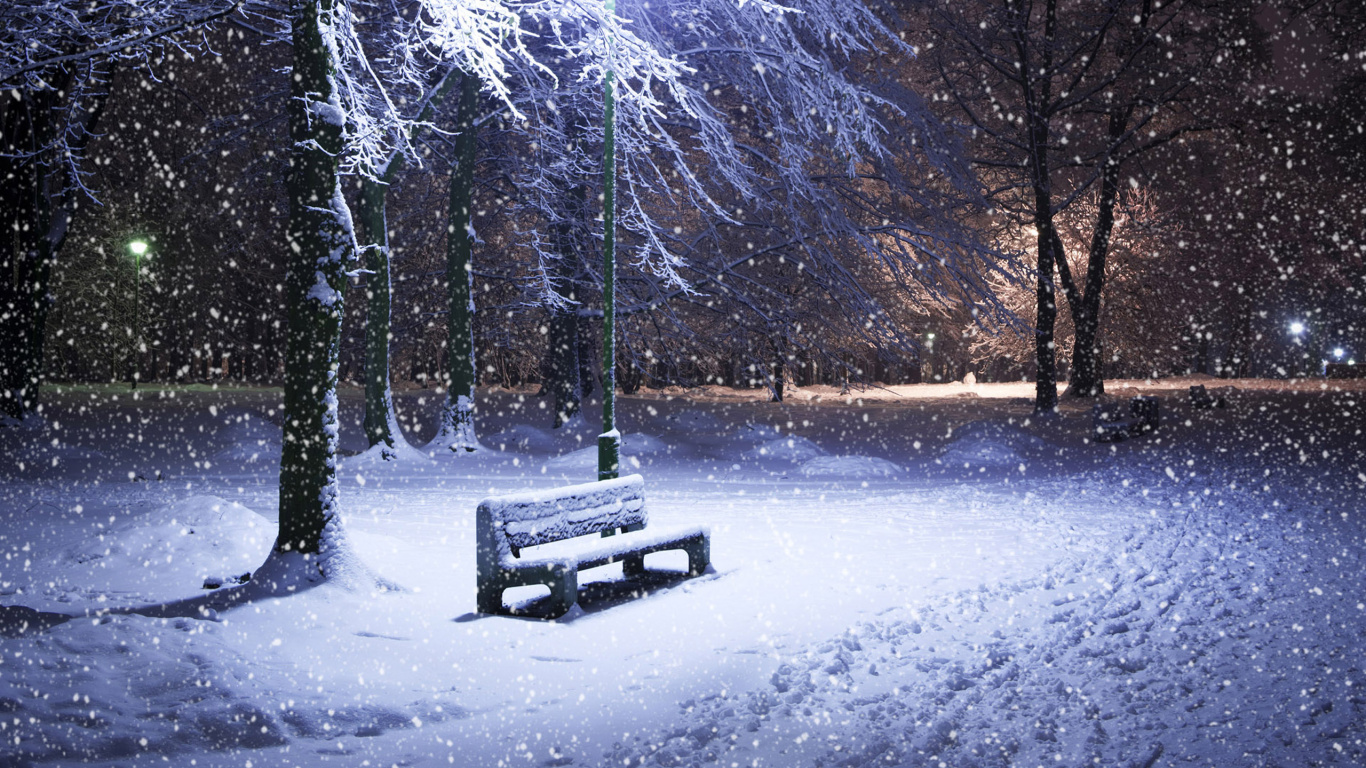 Brown Wooden Bench on Snow Covered Ground. Wallpaper in 1366x768 Resolution