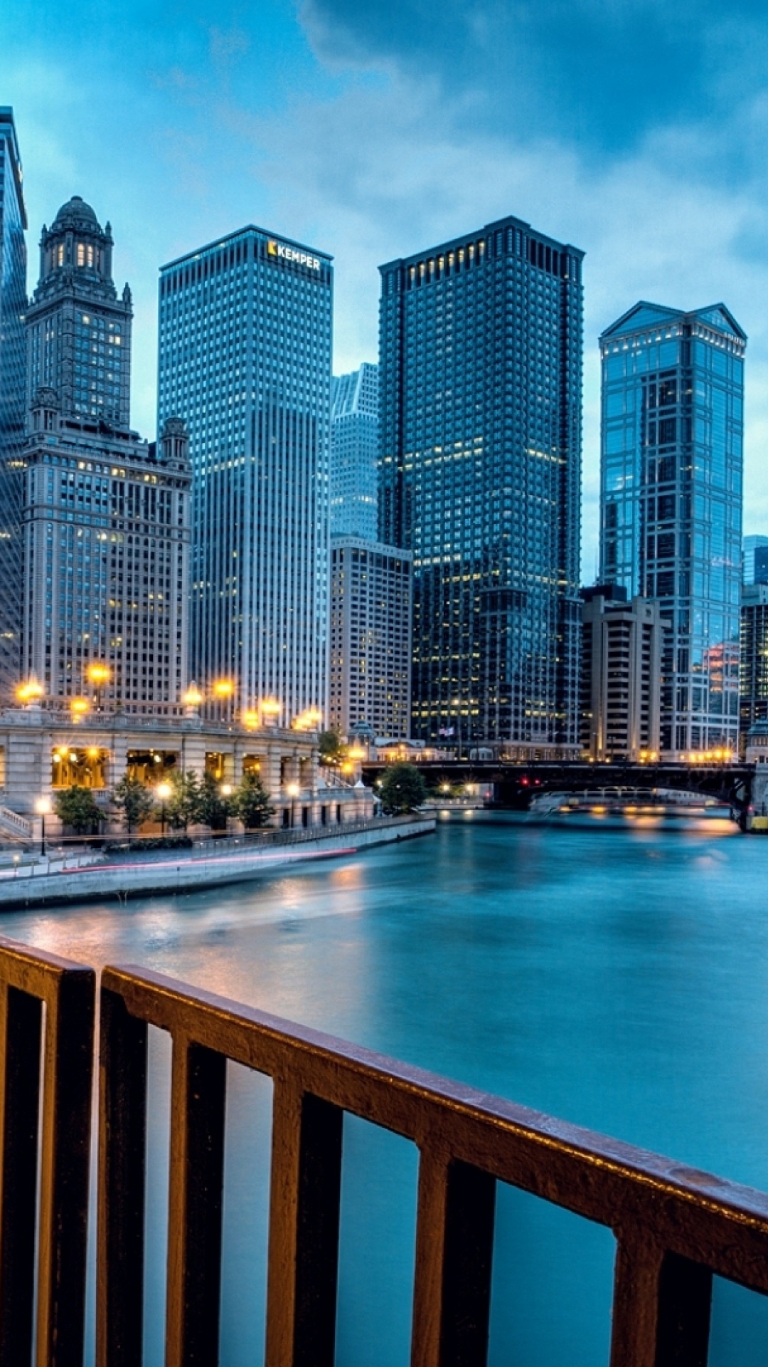 Body of Water Between High Rise Buildings During Night Time. Wallpaper in 1080x1920 Resolution