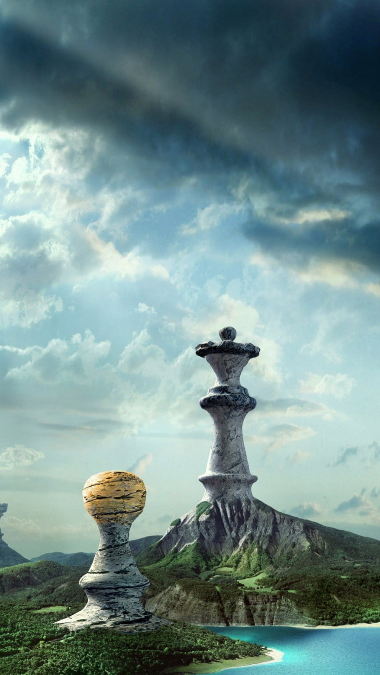 Estatua de Hormigón Gris y Marrón Bajo un Cielo Nublado Durante el Día. Wallpaper in 750x1334 Resolution